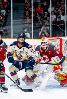 Dara Greig blocking the Ottawa Charge's goalie.